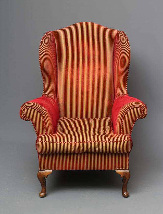A GEORGIAN STYLE WINGED BACK ARMCHAIR in stained beech upholstered in Rubelli red and gold velvet Image