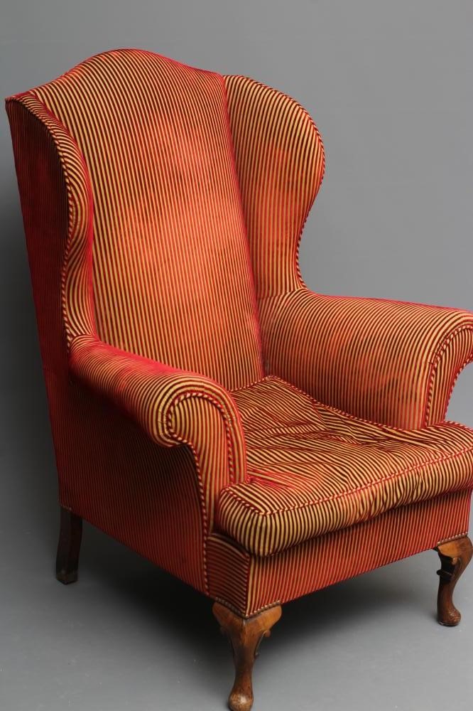 A GEORGIAN STYLE WINGED BACK ARMCHAIR in stained beech upholstered in Rubelli red and gold velvet Image