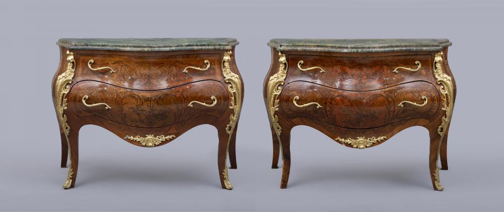 A PAIR OF LOUIS XV STYLE KINGWOOD AND MARQUETRY BOMBE COMMODES Image