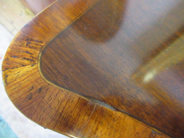 A GEORGIAN MAHOGANY AND MARQUETRY SIDEBOARD Image