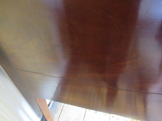 A GEORGIAN MAHOGANY AND MARQUETRY SIDEBOARD Image