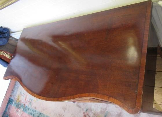 A GEORGIAN MAHOGANY AND MARQUETRY SIDEBOARD Image
