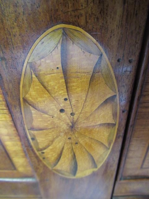 A GEORGIAN MAHOGANY AND MARQUETRY SIDEBOARD Image