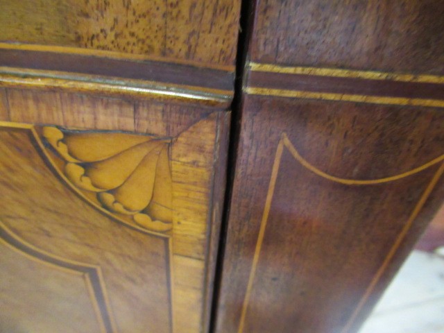 A GEORGIAN MAHOGANY AND MARQUETRY SIDEBOARD Image