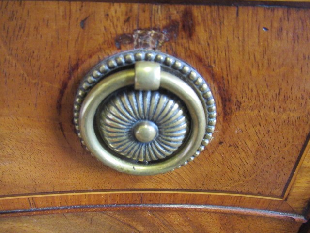 A GEORGIAN MAHOGANY AND MARQUETRY SIDEBOARD Image
