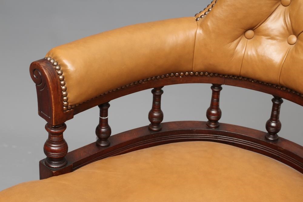 A VICTORIAN WALNUT TUB OFFICE CHAIR button upholstered in tan leather Image
