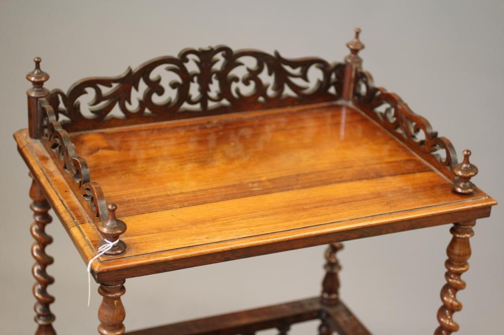 A VICTORIAN ROSEWOOD CANTERBURY WHATNOT Image