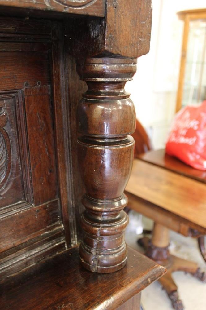 A CARVED JOINED OAK PRESS CUPBOARD Image