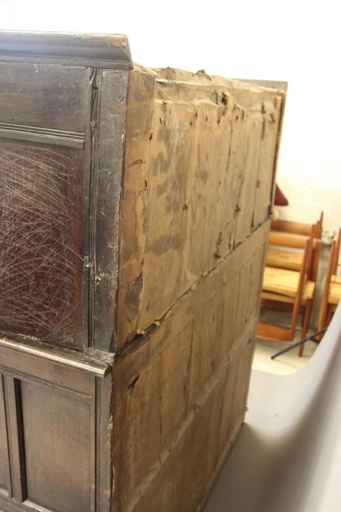 A CARVED JOINED OAK PRESS CUPBOARD Image