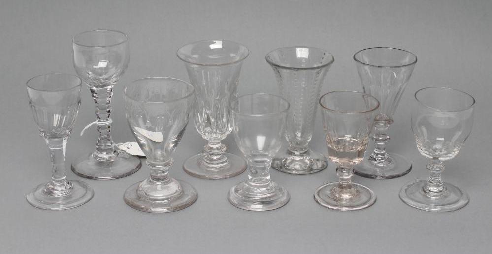 A COLLECTION OF NINE GEORGIAN AND LATER GLASSES including a cordial glass with facet cut stem Image