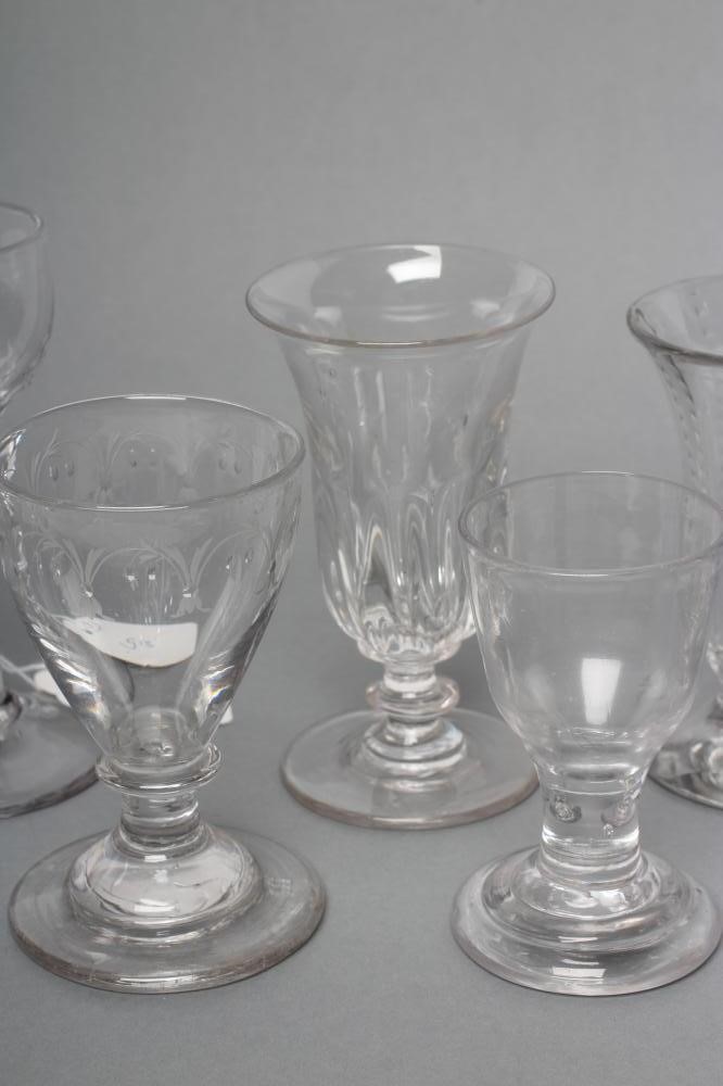 A COLLECTION OF NINE GEORGIAN AND LATER GLASSES including a cordial glass with facet cut stem Image
