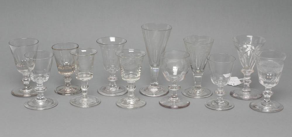 A COLLECTION OF SEVEN SMALL WINE GLASSES Image