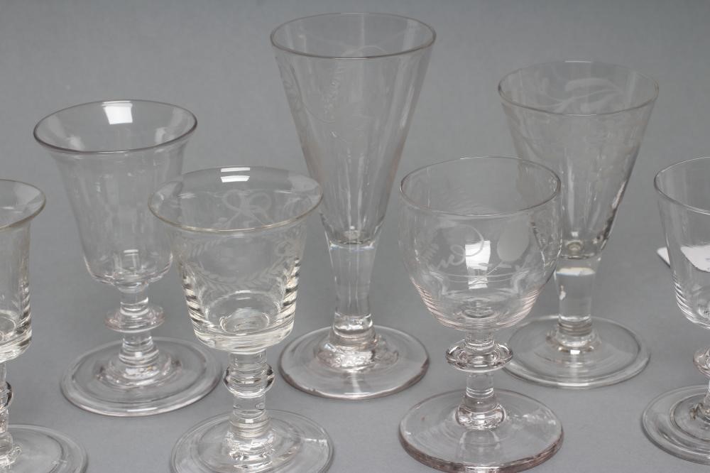 A COLLECTION OF SEVEN SMALL WINE GLASSES Image