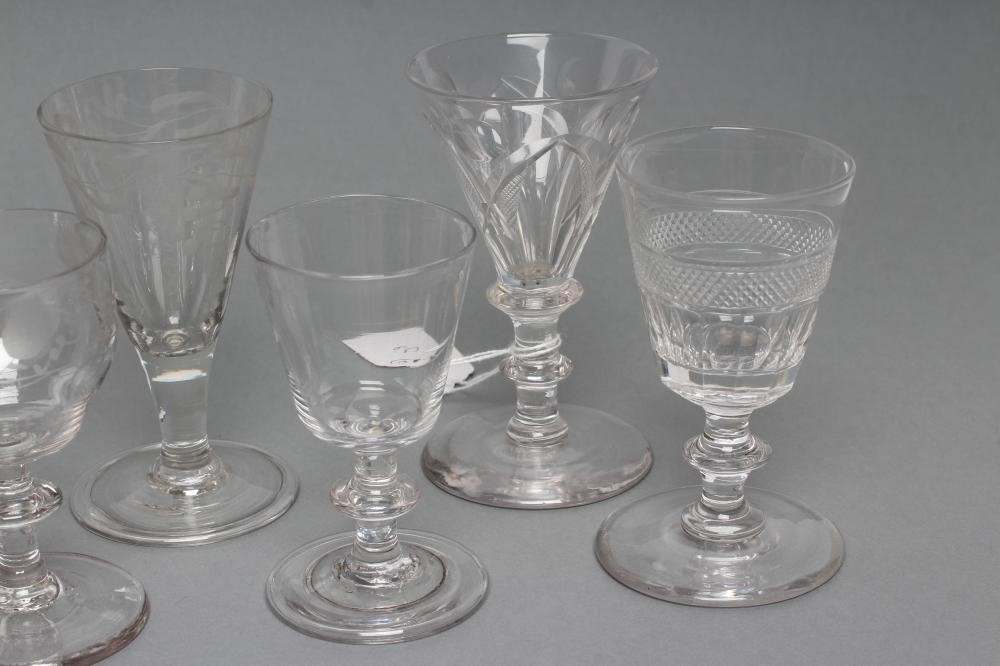 A COLLECTION OF SEVEN SMALL WINE GLASSES Image