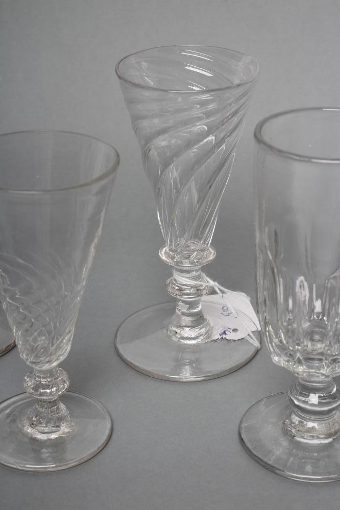 TWO SIMILAR DWARF GLASS ALE FLUTES Image