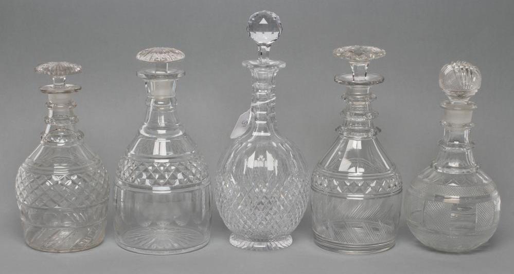 TWO VICTORIAN GLASS TRIPLE RING NECK MALLET DECANTERS AND STOPPERS with panelled shoulders and Image