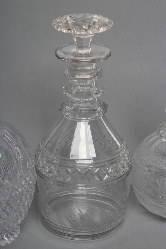TWO VICTORIAN GLASS TRIPLE RING NECK MALLET DECANTERS AND STOPPERS with panelled shoulders and Image
