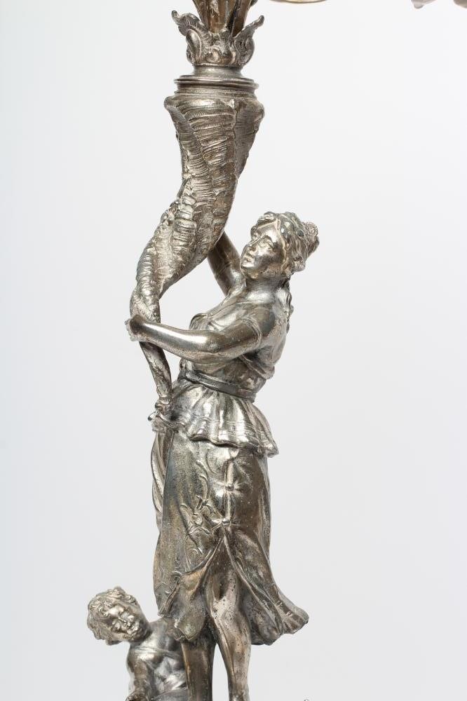 A LARGE FIGURAL SIX BRANCH SEVEN LIGHT TABLE CANDELABRUM Image