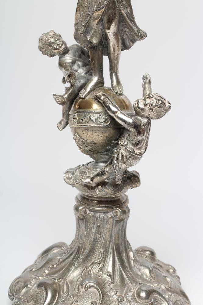 A LARGE FIGURAL SIX BRANCH SEVEN LIGHT TABLE CANDELABRUM Image
