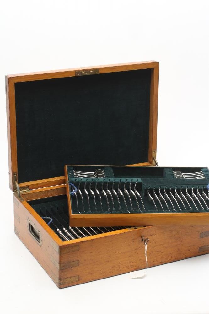 A TABLE SERVICE FOR TWELVE PLACE SETTINGS Image