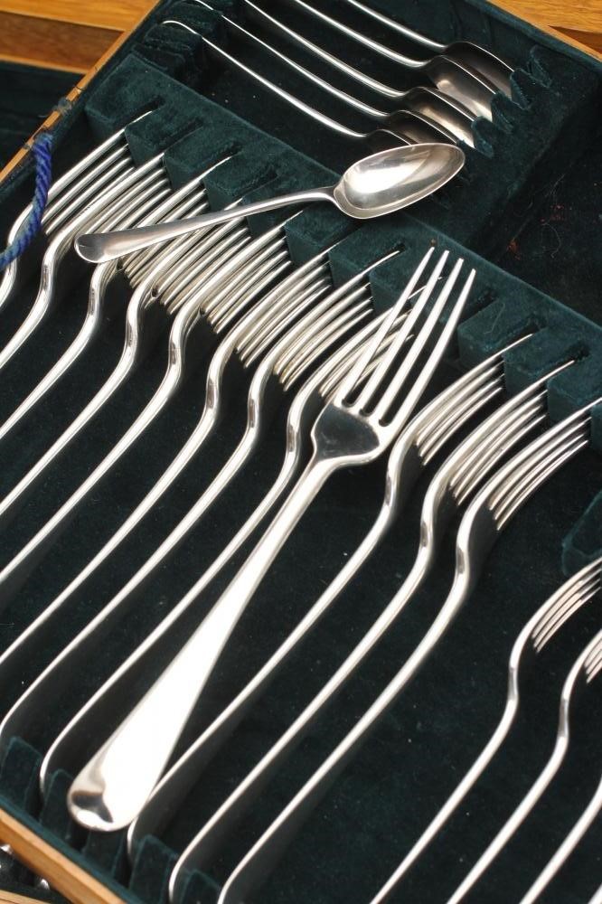 A TABLE SERVICE FOR TWELVE PLACE SETTINGS Image