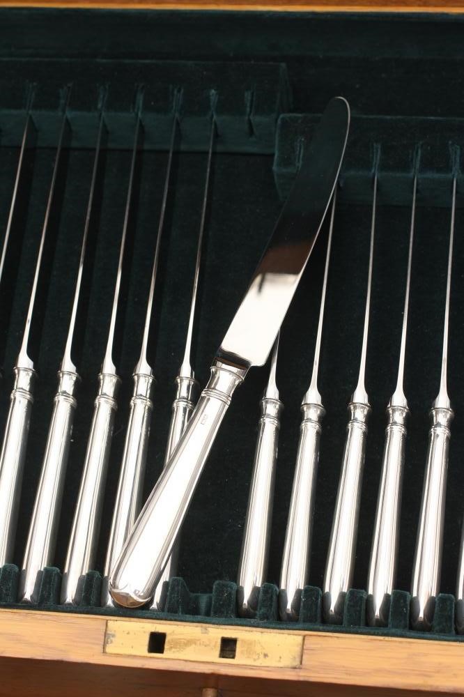 A TABLE SERVICE FOR TWELVE PLACE SETTINGS Image