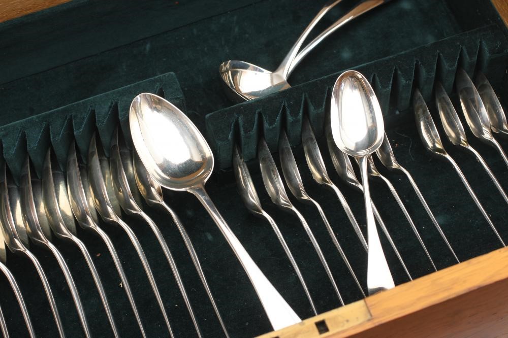 A TABLE SERVICE FOR TWELVE PLACE SETTINGS Image