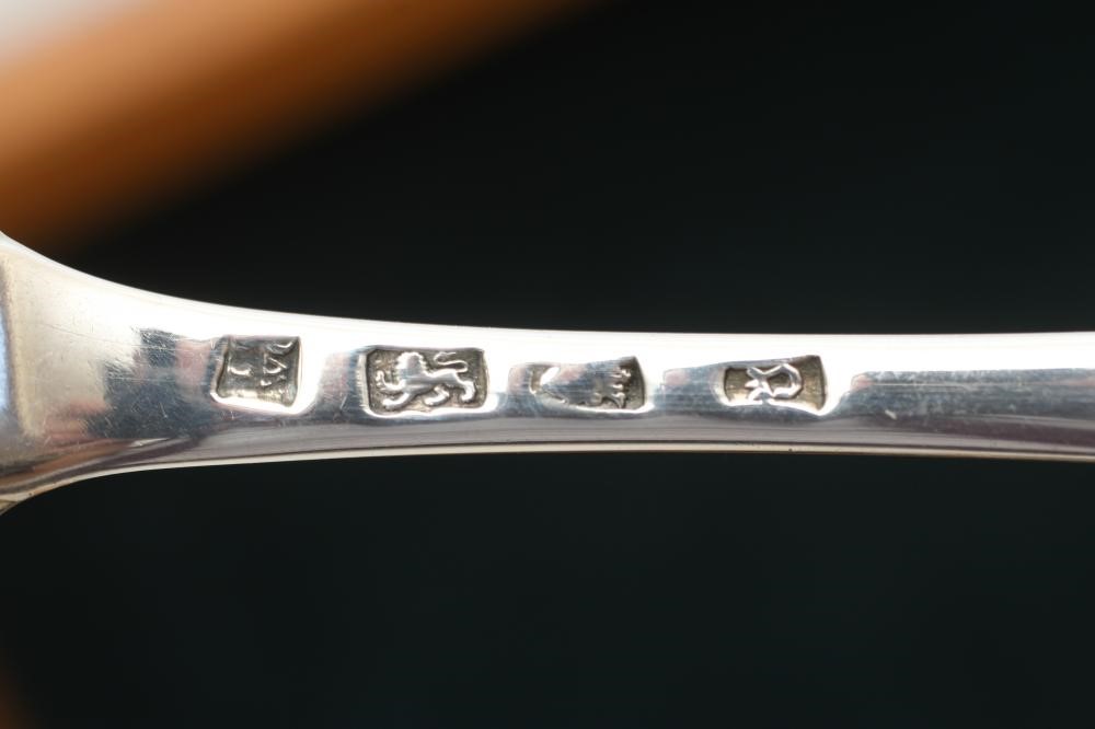 A TABLE SERVICE FOR TWELVE PLACE SETTINGS Image