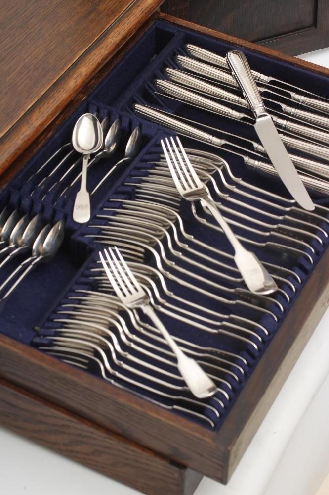 A TABLE SERVICE FOR TWELVE PLACE SETTINGS Image