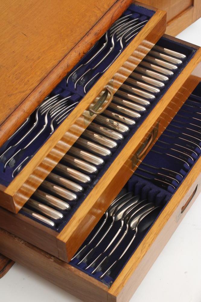 A TABLE SERVICE FOR TWELVE PLACE SETTINGS Image