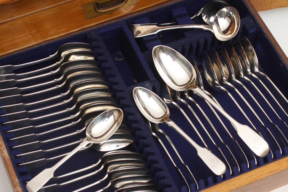 A TABLE SERVICE FOR TWELVE PLACE SETTINGS Image