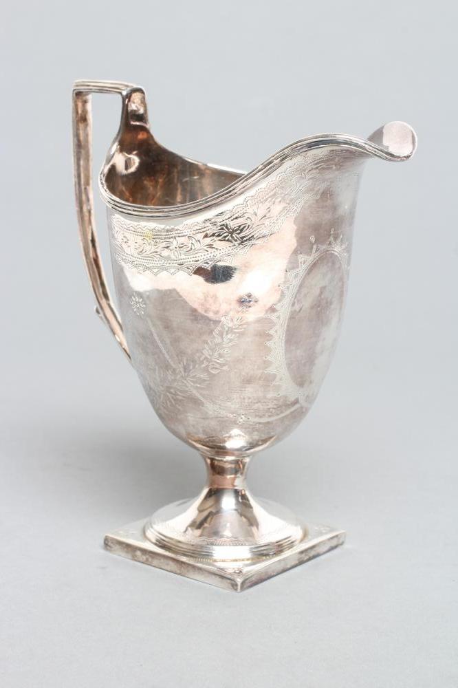 A LATE GEORGE III HELMET JUG Image