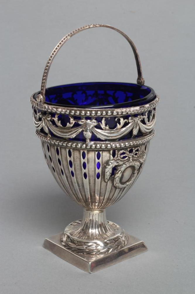 A GEORGE III SUGAR BASKET Image
