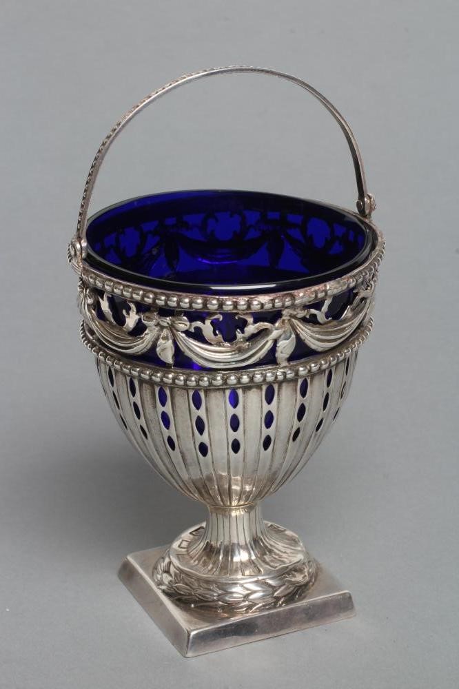 A GEORGE III SUGAR BASKET Image