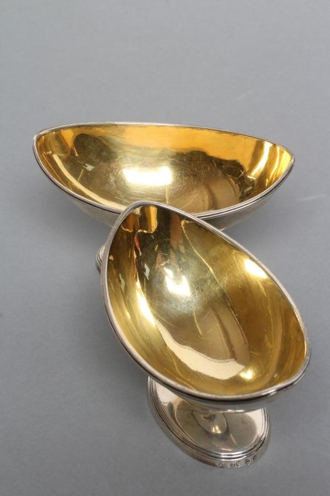 A PAIR OF GEORGE III PEDESTAL SALTS Image