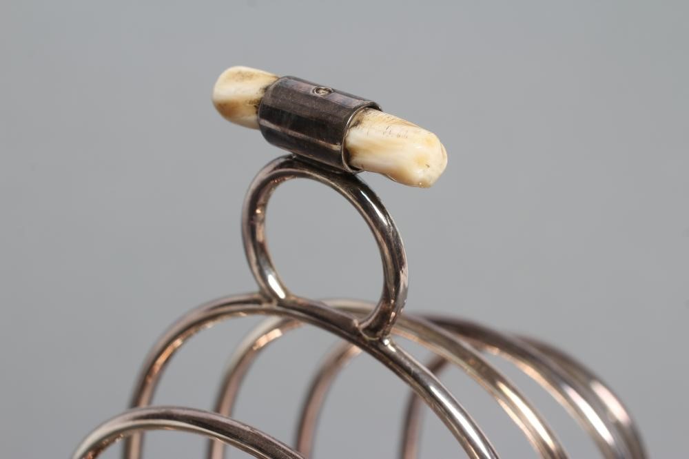 A TOASTRACK ON STAND WITH BURNER Image