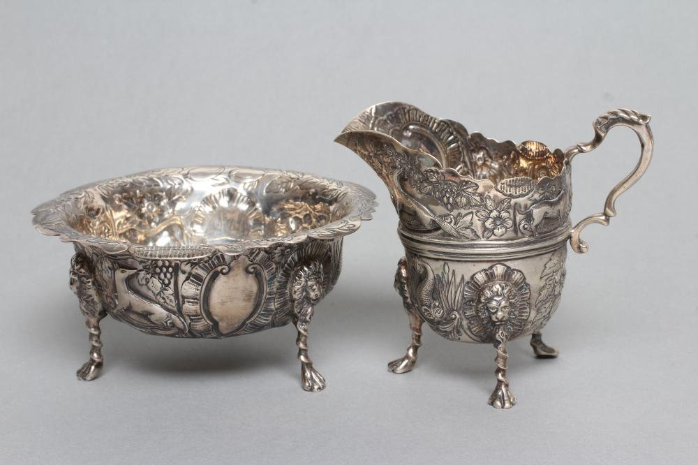 A LATE VICTORIAN CREAM JUG AND SUGAR BASIN Image