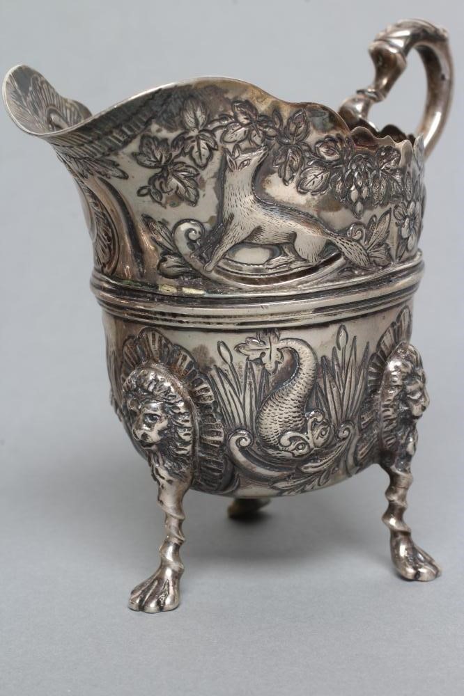 A LATE VICTORIAN CREAM JUG AND SUGAR BASIN Image