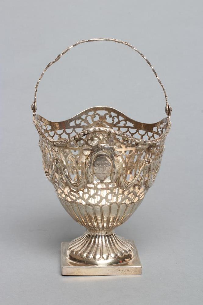 A GEORGE III SUGAR BASKET Image