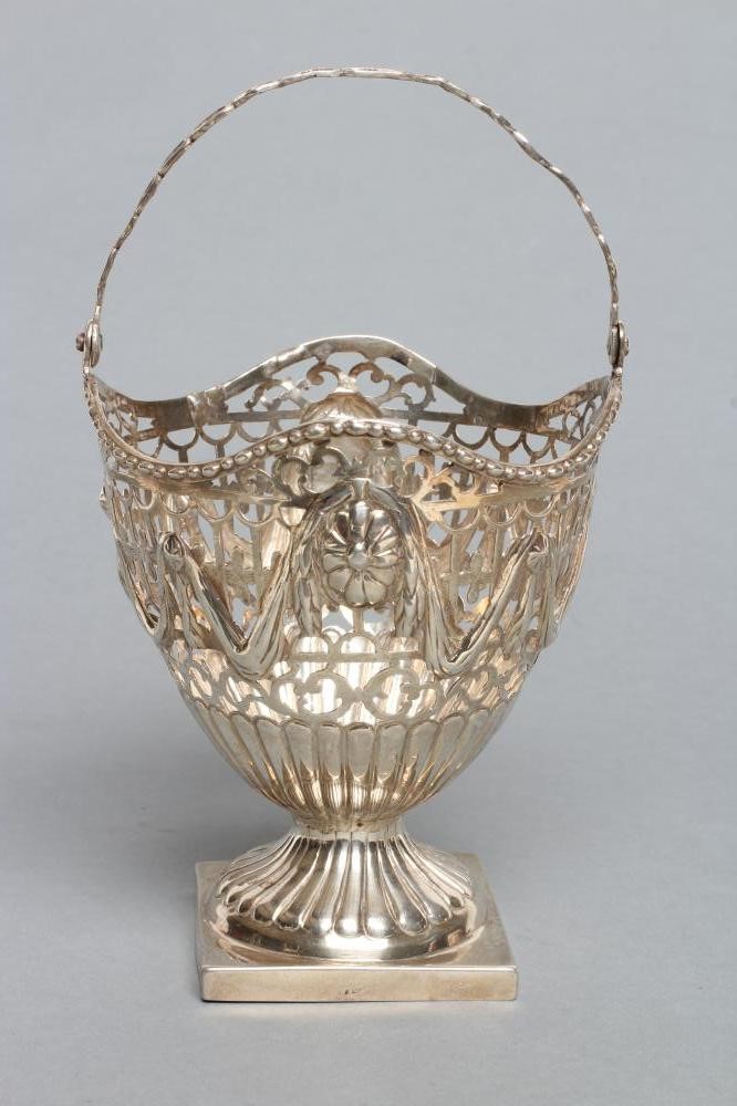 A GEORGE III SUGAR BASKET Image