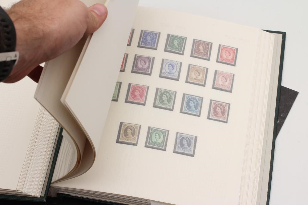 TWO ALBUMS CONTAINING REMAINDERED COLLECTION OF GB STAMPS from 1850's - 1950's.  Missing the top Image