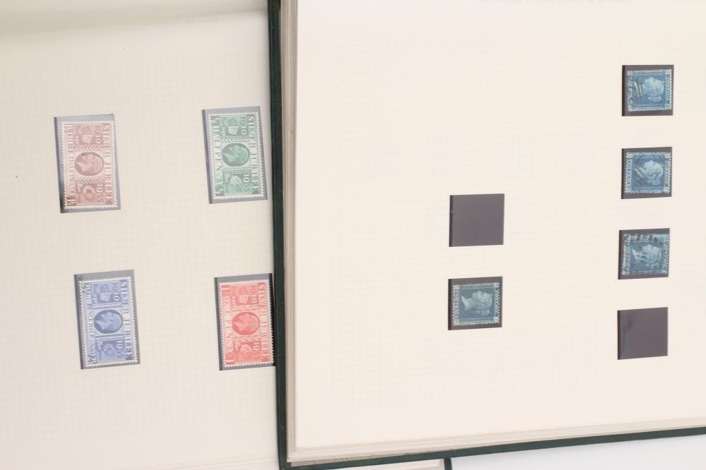 TWO ALBUMS CONTAINING REMAINDERED COLLECTION OF GB STAMPS from 1850's - 1950's.  Missing the top Image