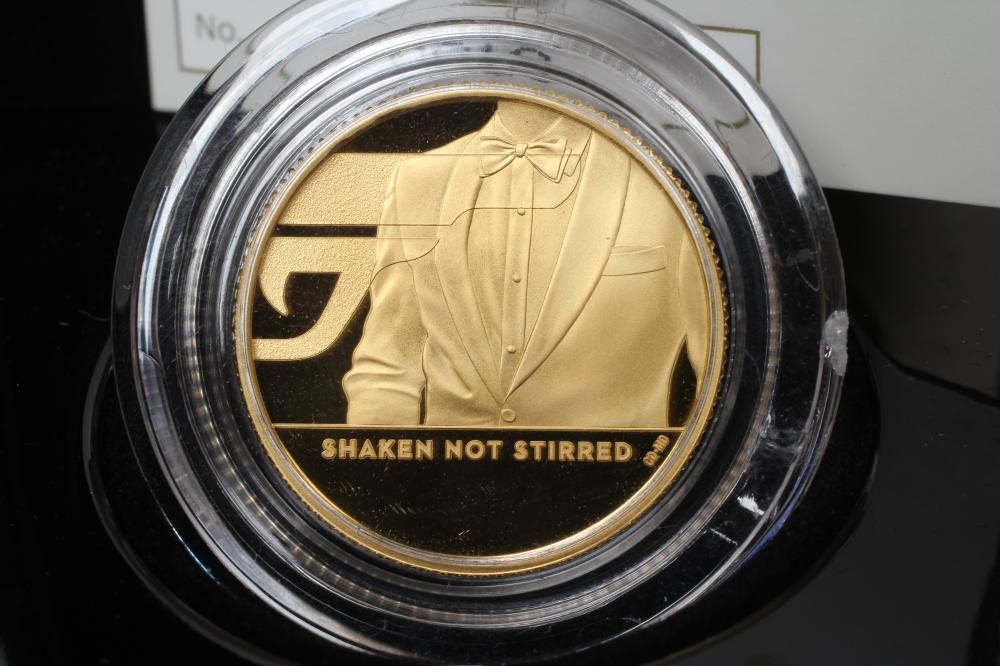 AN ELIZABETH II 007 "SHAKEN NOT STIRRED" 1/4 OZ GOLD PROOF COIN Image
