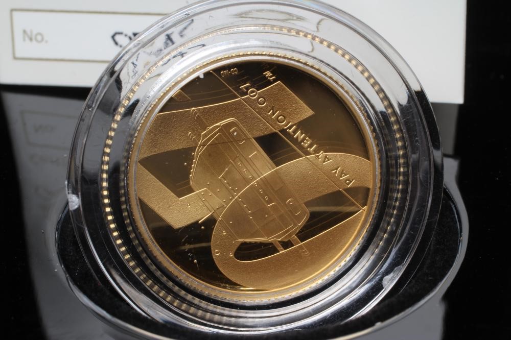 AN ELIZABETH II 007 "PAY ATTENTION 007" 1/4OZ GOLD PROOF COIN Image