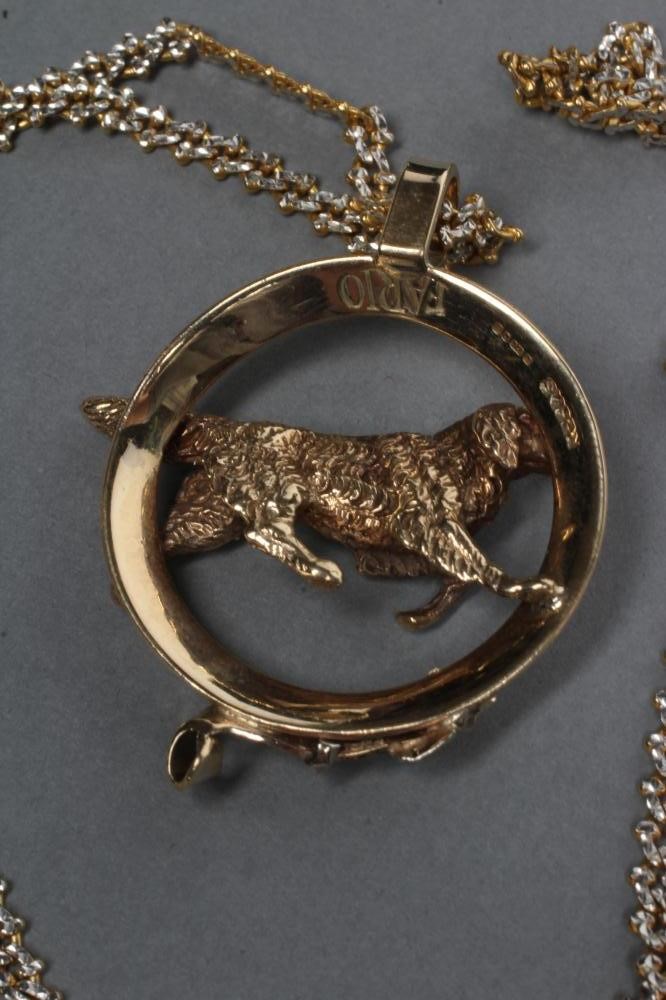 A 9CT GOLD PENDANT modelled as a buckled collar and centred by a dog Image