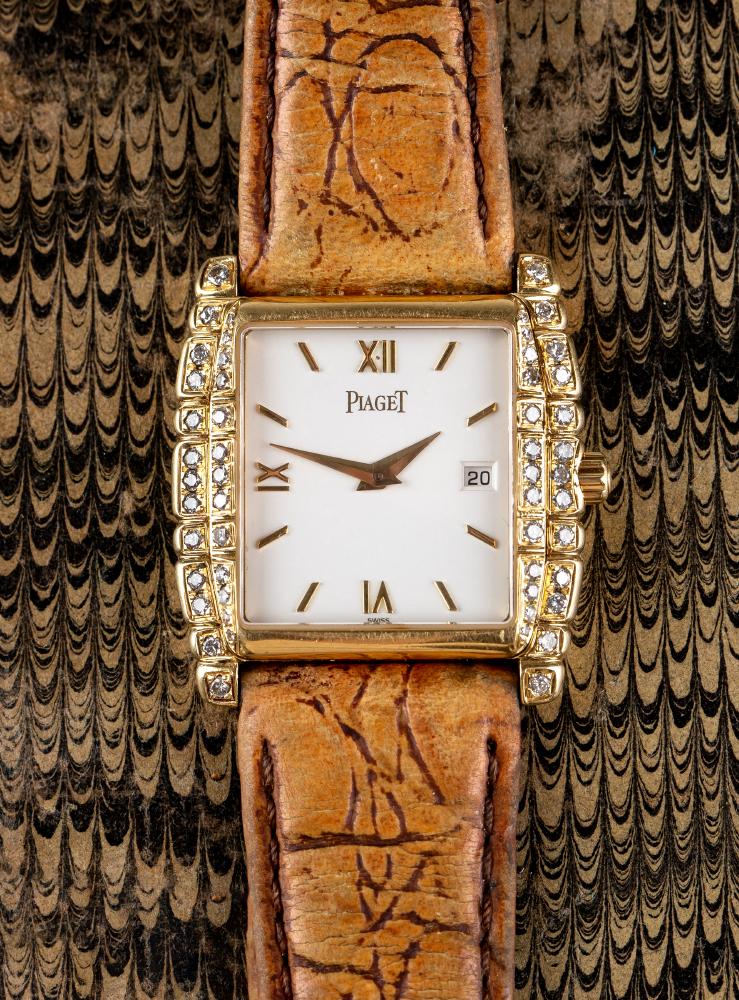 A LADY'S 18CT GOLD AND DIAMOND PIAGET WRISTWATCH Image