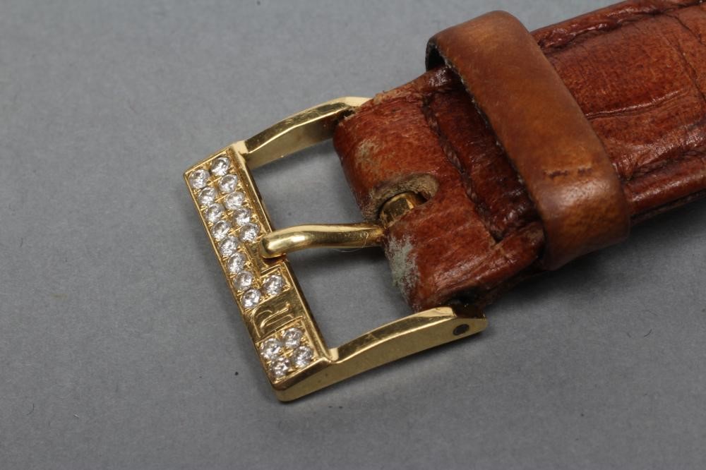 A LADY'S 18CT GOLD AND DIAMOND PIAGET WRISTWATCH Image