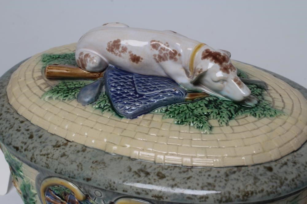 A VICTORIAN MINTON MAJOLICA GAME PIE DISH AND COVER of oval basket weave form with naturalistic Image