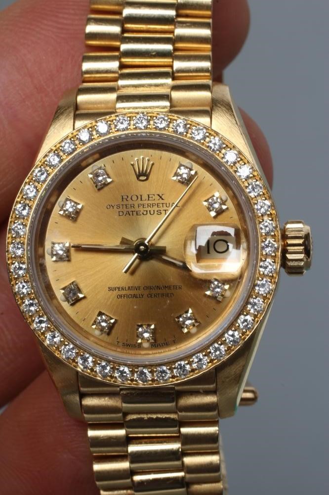 A LADY'S 18CT GOLD AND DIAMOND ROLEX OYSTER PERPETUAL DATEJUST SUPERLATIVE CHRONOMETER Image