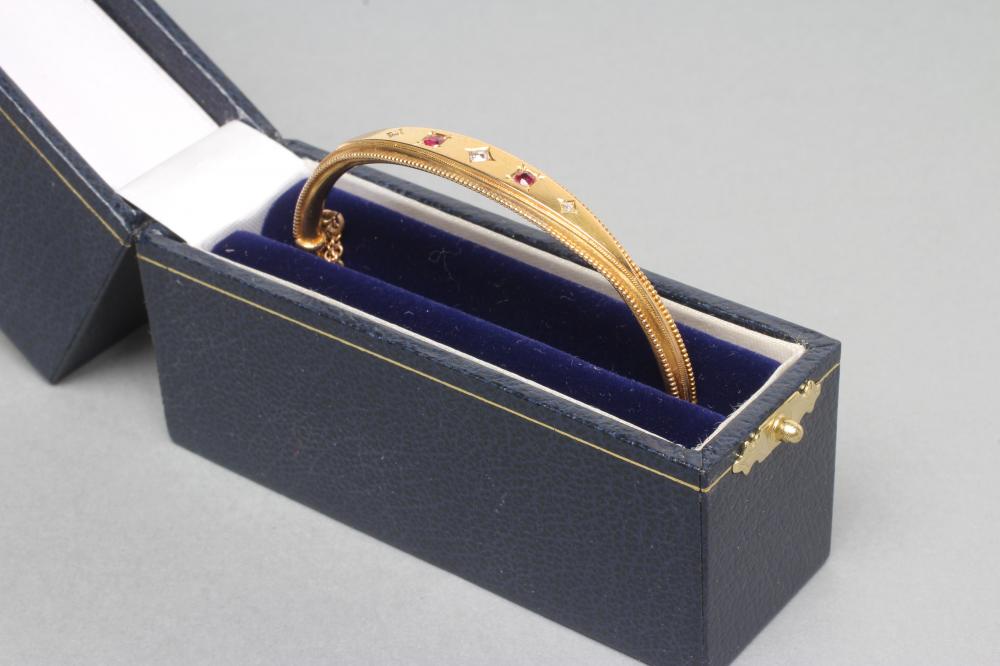 AN EDWARDIAN STIFF HINGED BANGLE Image